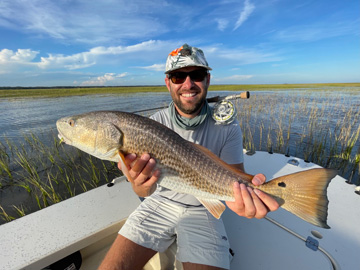 Redfish on a fly, flood tide fly fishing charters